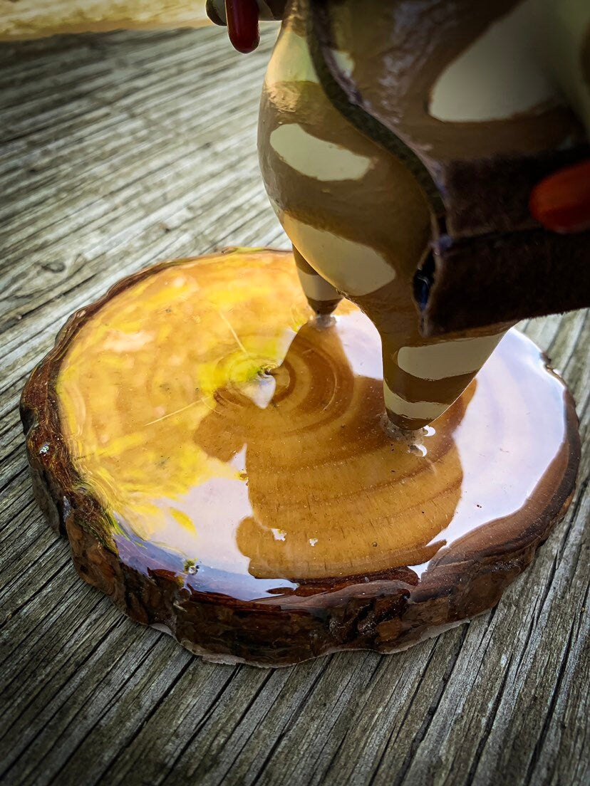 Hestu statue showing wooden epoxy base