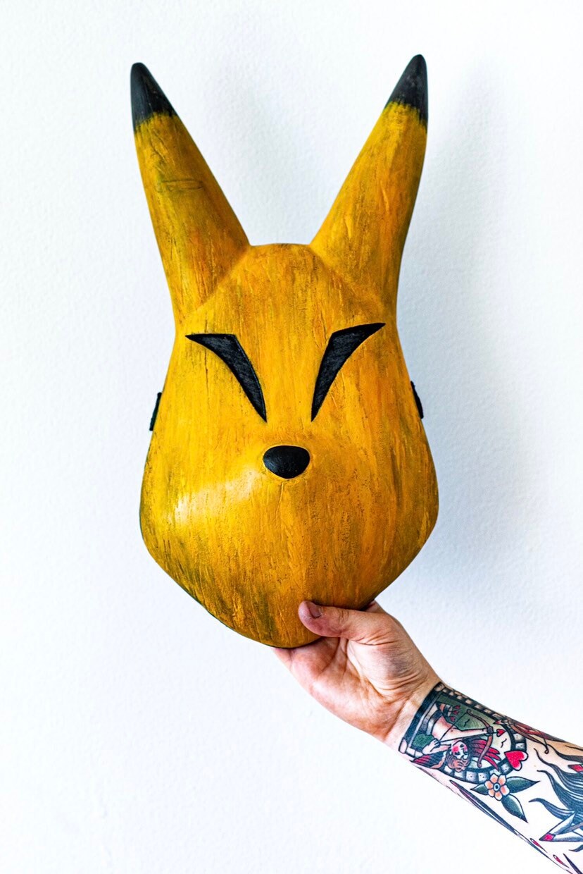Keaton Mask Wooden Replica // The Legend of Zelda being held by hand