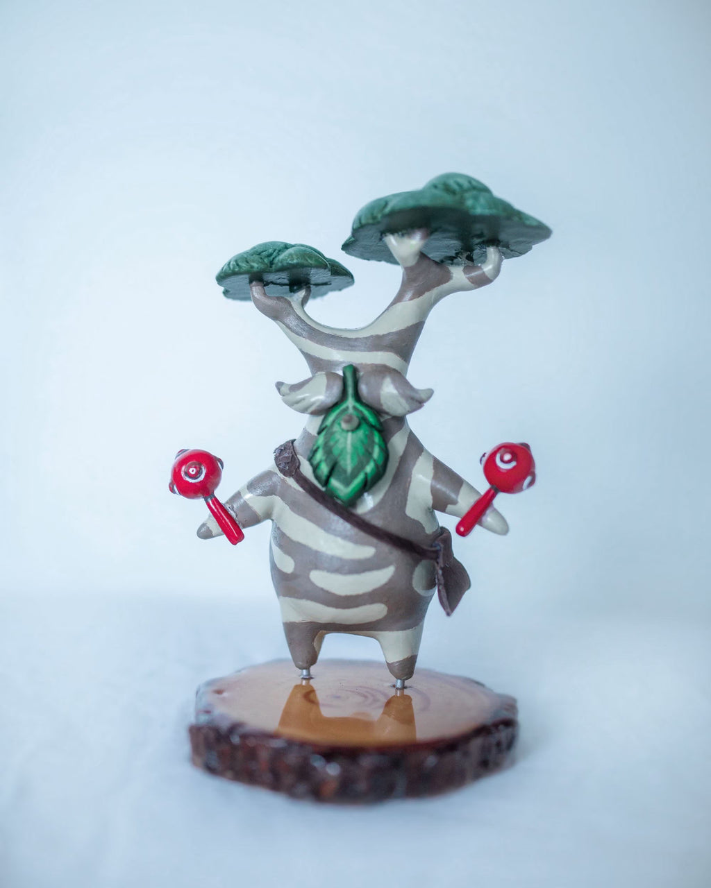 Hand made Hestu statue against a white background